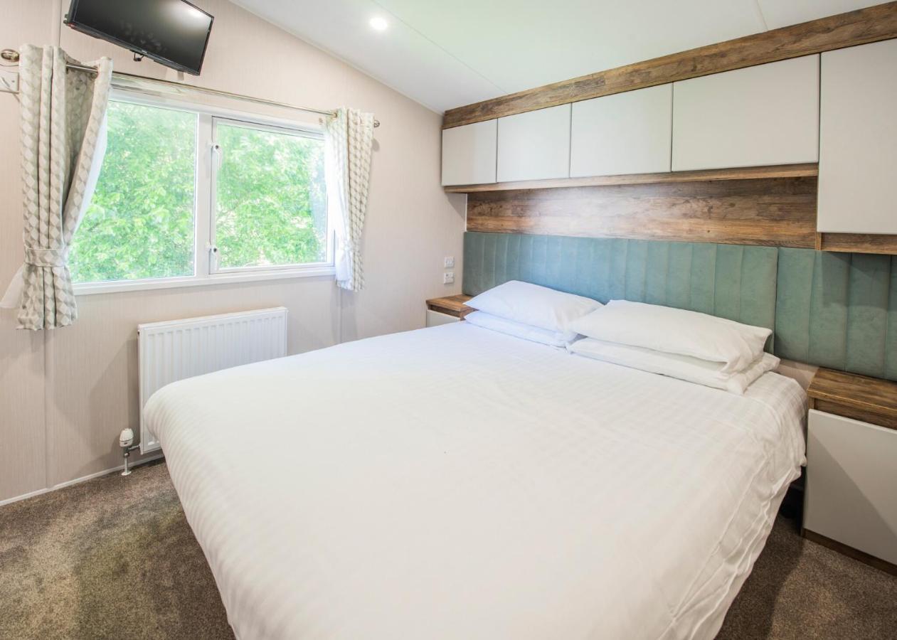 Sandaway Beach Holiday Park คอมบ์มาร์ติน ภายนอก รูปภาพ